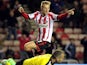 Sunderland's Swedish midfielder Sebastian Larsson celebrates scoring his team's second goal during the English League Cup football match between Sunderland AFC and Southampton FC at the Stadium of Light in Sunderland, northern England, on November 6, 2013