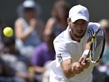 Serbia's Viktor Troicki returns against Russia's Mikhail Youzhny in their third round men's singles match on day six of the 2013 Wimbledon Championships tennis tournament at the All England Club in Wimbledon, southwest London, on June 29, 2013