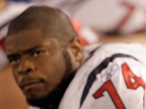 Wade Smith of the Houston Texans look on from the bench during the closing moments of the Texans 29-14 loss to the Baltimore Ravens on October 16, 2011