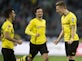 Half-Time Report: Reus brace gives Dortmund hope