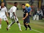 Yuto Nagatomo of FC Inter Milan and Ibrahima Mbaye of AS Livorno Calcio compete for the ball during the Serie A match on November 9, 2013