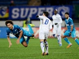 Zenit Saint-Petersburg's Axel Witsel vies with Porto's Josue during their UEFA Champions League group G footbal match in Saint Petersburg on November 6, 2013