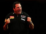 Adrian Lewis of England celebrates winning a set during the quarter final match between Adrian Lewis of England and Michael Van Gerwen of Netherlands on December 29, 2012