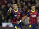 Barcelona's Chilean forward Alexis Sanchez celebrates after scoring during the Spanish league football match FC Barcelona vs RCD Espanyol at the Camp Nou stadium in Barcelona on November 1, 2013