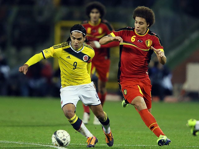 Belgium's Axel Witsel and Colombia's Radamel Falcao battle for the ball during an international friendly match on November 14, 2013
