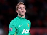 Ben Amos of Manchester United looks on during the Carling Cup Quarter Final match between Manchester United and Crystal Palace at Old Trafford on November 30, 2011
