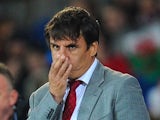 Wales manager Chris Coleman looks on during the FIFA 2014 World Cup Qualifier Group D match between Wales and Macedonia at Cardiff City Stadium on October 11, 2013