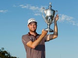 Chris Kirk poses with the trophy after winning The McGladrey Classic at Sea Island's Seaside Course on November 10, 2013
