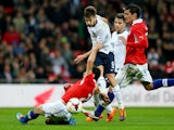 Adam Lallana of England shoots for goal during the international friendly match between England and Chile at Wembley Stadium on November 15, 2013