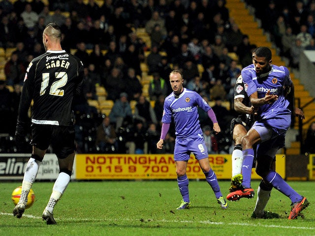 Ethan Ebanks-Landell of Wolverhampton Wanderers scores the opening goal during the Sky Bet League One match against Notts County on November 16, 2013