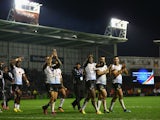 The players of Fiji acknowledge the crowds applause on their lap of honour during the Rugby League World Cup Quarter Final match between Samoa on November 17, 2013