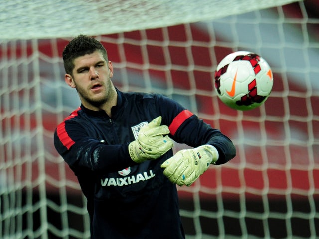 Fraser Forster of England looks on prior to the international friendly match between England and Chile at Wembley Stadium on November 15, 2013