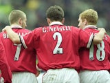 Gary Neville, Paul Scholes and David Beckham celebrate a Manchester United goal against West Ham United on April 01, 2000.