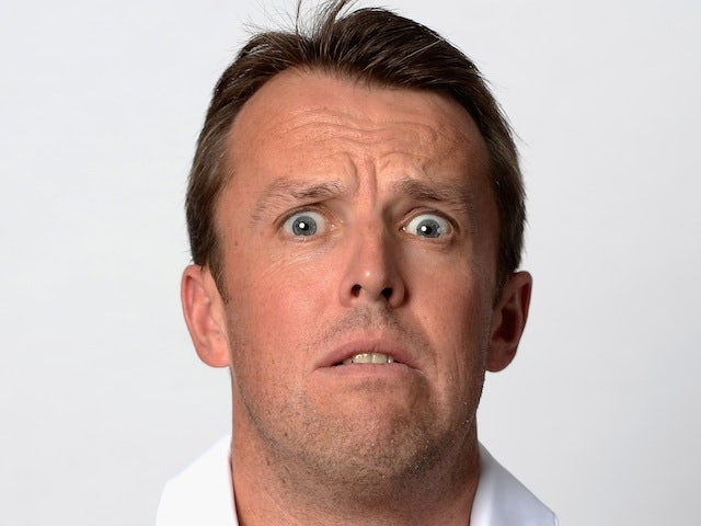 England spin bowler Graeme Swann pulls a funny face during a headshots session ahead of the 2013 Winter Ashes series on November 11, 2013