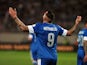 Greece's Kostas Mitroglou celebrates after scoring during the 2014 FIFA World Cup qualifying play-off first leg football match between Greece and Romania at the Karaiskaki stadium in Athens on November 15, 2013