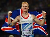 Greg Rutherford celebrates after winning gold in the Olympic long jump event at London 2012 on August 4, 2012
