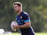 Henry Trinder runs with the ball during the England training session held at Pennyhill Park on October 29, 2013