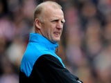 Hull City Football Management Consultant Iain Dowie looks on during the Barclays Premier League match between Stoke City on April 30, 2010