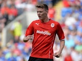 Joe Mason of Cardiff City in action during the Pre Season Friendly match between Cardiff City and Athletic Club de Bilbao at the Cardiff City Stadium on August 10, 2013