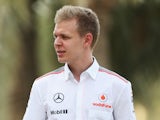 Kevin Magnussen of Finland and McLaren walks in the paddock following practice for the Bahrain Formula One Grand Prix on April 19, 2013
