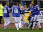 Liam Noble of Carlisle United celebrates with team-mates after he scored the first goal from the penalty spot during the Sky Bet League one match against Crawley Town at Brunton Park on November 16, 2013