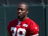 Marcus Lattimore of the San Francisco 49ers watches his team during the San Francisco 49ers rookie minicamp at their training facility on May 10, 2013 