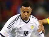 Matty Phillips of Scotland in action with Nacer Chadli of Belgium during the FIFA 2012 World Cup Qualifier match between Belgium and Scotland on October 16, 2012