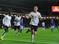England's Michael Keane celebrates after scoring the opening goal against Finland during their 2015 UEFA European Under 21 Championships Qualifier Group 1 match on November 14, 2013