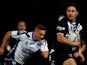 Shaun Johnson of New Zealand runs in to score a try during the Rugby League World Cup Quarter Final match between New Zealand and Scotland at Headingley Stadium on November 15, 2013
