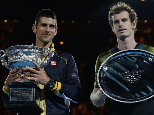 Novak Djokovic and Andy Murray pose with their Australian Open trophies on January 27, 2013.