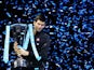 Novak Djokovic poses with the ATP World Tour Finals trophy on November 11, 2013.