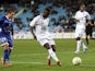 Auxerre's Paul-Georges Ntep de Madiba controls the ball in front of Bastia's French defender Gilles Cioni during the French League Cup football match Bastia (SCB) vs Auxerre (AJA) in the Armand Cesari stadium in Bastia, Corsica, on November 7, 2012