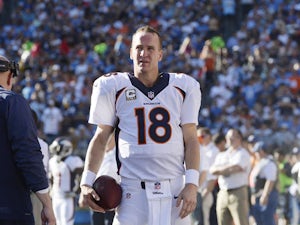 Manning breaks NFL passing touchdown record