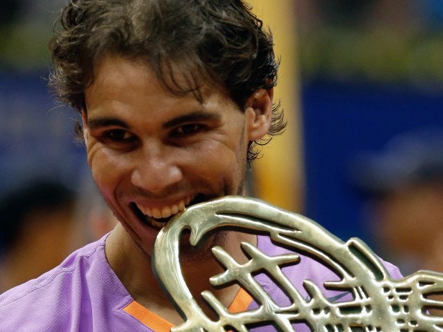 Rafael Nadal celebrates winning the Brazil Open on February 17, 2013.