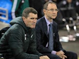 Republic of Ireland's manager Martin O'Neill looks on with assistant manager Roy Keane before the start of the international friendly football match between the Republic of Ireland and Latvia at Aviva Stadium in Dublin on November 15, 2013