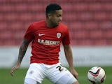 Reuben Noble-Lazarus of Barnsley plays the ball during a pre-season friendly against Club Brugge at Oakwell Stadium on July 12, 2013