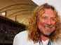 Rock legend Robert Plant seen on the grid before the Bahrain Formula One Grand Prix at the Bahrain International Circuit on April 26, 2009