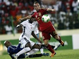 Spain's midfielder Santiago Cazorla scores the opener during the FIFA 2014 World Cup friendly football match Equatorial Guinea vs Spain at the Olympic stadium in Malabo on November 16, 2013