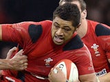 Wales' Toby Faletau holds off South Africa's Francois Louw during the International rugby union test on November 9, 2013