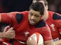 Wales' Toby Faletau holds off South Africa's Francois Louw during the International rugby union test on November 9, 2013