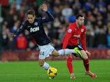 Man United's Adnan Januzaj and Cardiff Don Cowie battle for the ball during their Premier League match on November 24, 2013