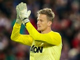 Goalkeeper Anders Lindegaard of Manchester United acknowledges the crowd at fulltime during the match between the A-League All-Stars and Manchester United at ANZ Stadium on July 20, 2013