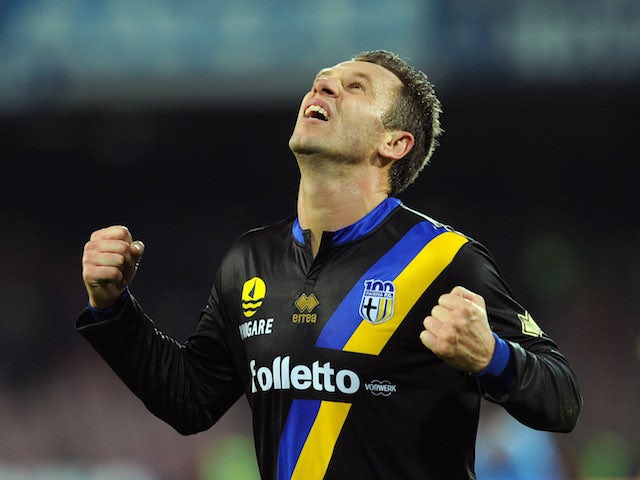 Antonio Cassano of Parma celebrates afer scoring the opening goal during the Serie A match between SSC Napoli and Parma FC at Stadio San Paolo on November 23, 2013