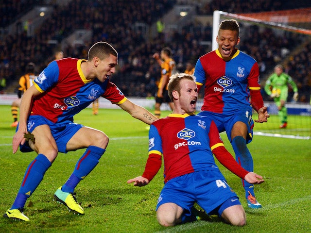 Barry Bannan of Crystal Palace celebrates scoring the opening goal with team mates during the Barclays Premier League match between Hull City on November 23, 2013