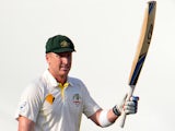 Australian batsman Brad Haddin celebrates his 50 runs innings during day one of the first Ashes cricket Test match between England and Australia at the Gabba Cricket Ground in Brisbane on November 21, 2013