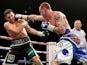 Carl Froch and George Groves in action during their IBF & WBA World Super Middleweight Title fight on November 23, 2013