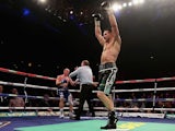 Carl Froch celebrates victory over George Groves as the referee stops the fight in the ninth round during their IBF & WBA World Super Middleweight Title fight on November 23, 2013