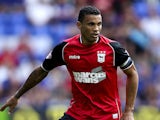 Carlos Edwards of Ipswich in action during the Sky Bet Championship match between Reading and Ipswich Town at the Madejski Stadium on August 03, 2013