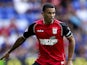 Carlos Edwards of Ipswich in action during the Sky Bet Championship match between Reading and Ipswich Town at the Madejski Stadium on August 03, 2013