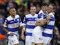 Charlie Austin of QPR celebrates with team mate Clint Hill after scoring the first goal of the game during the Sky Bet Championship match against Charlton on November 23, 2013